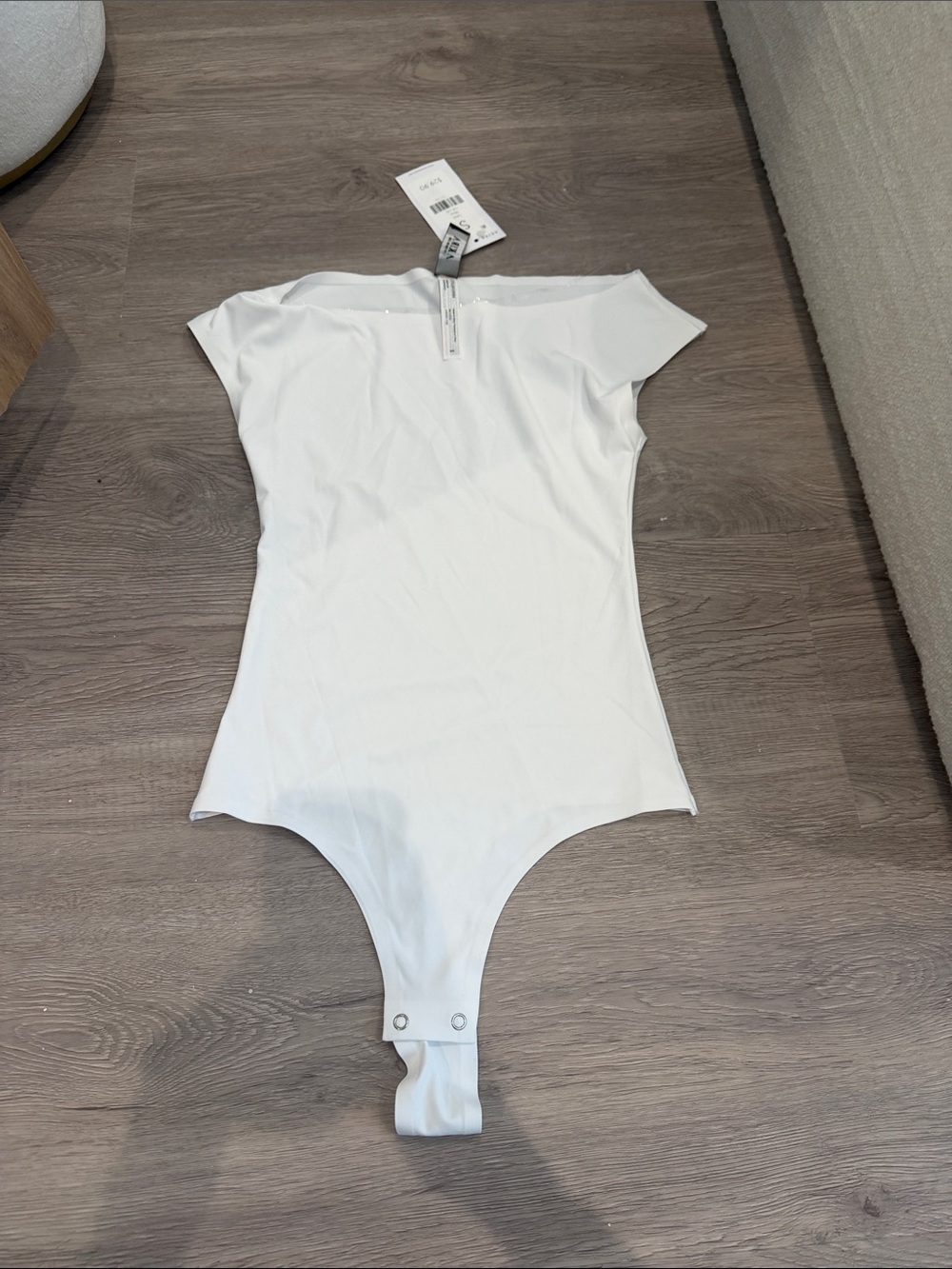 AKIRA White Off-Shoulder Kids Bodysuit